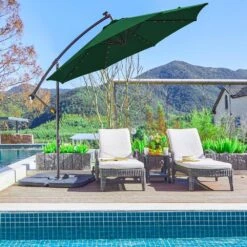 10 Ft. Steel Solar Lighted Cantilever Patio Umbrellas With Sandbag Weighted Base In Green -More Furniture Store cantilever umbrellas 10dzxj green d4 1000