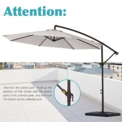 10 Ft. Steel Cantilever Patio Umbrella With Weighted Base In Off-White -More Furniture Store cantilever umbrellas 10xj dz wt 44 1000