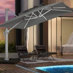 Rectangular 10 Ft. X 10 Ft. Aluminum Solar Lighted Cantilever Patio Umbrella With Cover In Gray 14 Rectangular 10 Ft. X 10 Ft. Aluminum Solar Lighted Cantilever Patio Umbrella With Cover In Gray -More Furniture Store cantilever umbrellas bet10x10 dt gy d4 1000