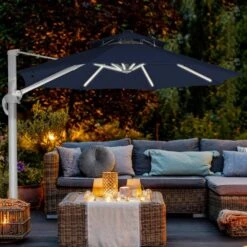 Deluxe 11 Ft. Aluminum Cantilever Solar Patio Umbrella With LED Light Tubes In Navy -More Furniture Store cantilever umbrellas bet11 dt ny 31 1000