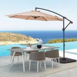 Curvy 10 Ft. Steel Large Cantilever Patio Umbrella With Cross Base In Beige -More Furniture Store cantilever umbrellas s 10xjs beige 40 1000