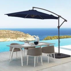Curvy 10 Ft. Steel Large Cantilever Patio Umbrella With Cross Base In Navy -More Furniture Store cantilever umbrellas s 10xjs navy 40 1000
