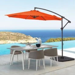 Curvy 10 Ft. Steel Large Cantilever Patio Umbrella With Cross Base In Orange -More Furniture Store cantilever umbrellas s 10xjs orange 40 1000
