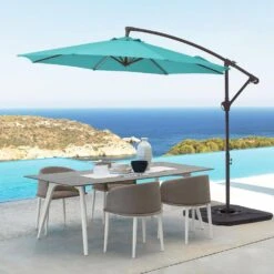 Curvy 10 Ft. Steel Large Cantilever Patio Umbrella With Cross Base In Peacock Blue -More Furniture Store cantilever umbrellas s 10xjs pblue 40 1000