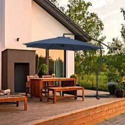 Curvy 11 Ft. Steel Large Cantilever Patio Umbrella With Sandbag And Cross Base In Navy