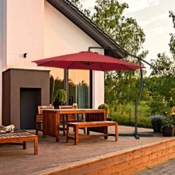 Curvy 11 Ft. Steel Large Cantilever Patio Umbrella With Sandbag And Cross Base In Red