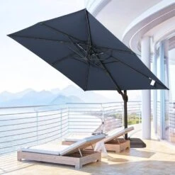 10 Ft. X 10 Ft. Sunbrella 99% Anti-UV Square Outdoor Cantilever Patio Umbrella With Weighted Base In Navy -More Furniture Store cantilever umbrellas sunbrella navy d4 1000