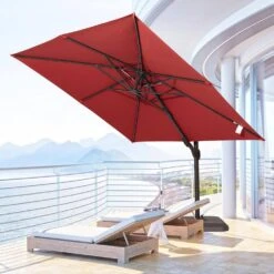 10 Ft. X 10 Ft. Sunbrella 99% Anti-UV Square Outdoor Cantilever Patio Umbrella With Weighted Base In Red -More Furniture Store cantilever umbrellas sunbrella red d4 1000