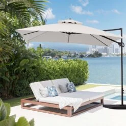 10 X 10 Ft. Steel Cantilever Patio Umbrella In Cream -More Furniture Store jearey cantilever umbrellas 10cusb cream c3 1000
