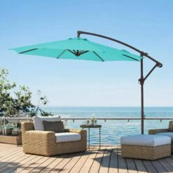 10 Ft. Cantilever Round Offset Patio Umbrella In Peacock Blue -More Furniture Store jearey cantilever umbrellas 10xjs2 pb 31 1000