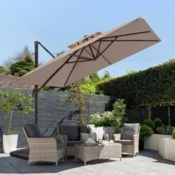 12 Ft. X 12 Ft. Aluminum Cantilever Patio Umbrella With Weighted Base In Beige -More Furniture Store jearey cantilever umbrellas fx12ddz bg 40 1000