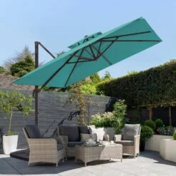 12 Ft. X 12 Ft. Aluminum Cantilever Patio Umbrella With Weighted Base In Peacock Blue -More Furniture Store jearey cantilever umbrellas fx12ddz pb 40 1000
