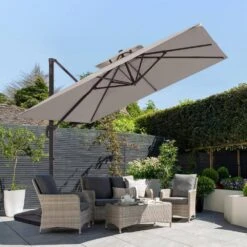12 Ft. X 12 Ft. Aluminum Cantilever Patio Umbrella With Weighted Base In Off-White -More Furniture Store jearey cantilever umbrellas fx12ddz wt 40 1000
