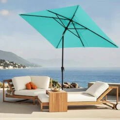 6.5 Ft. X 10 Ft. Steel Market Tilt Patio Umbrella In Peacock Blue -More Furniture Store jearey market umbrellas 6 5jxs pb 31 1000