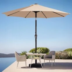 9 Ft. Market Solar LED Lighted Tilt Patio Umbrella Outdoor Steel Umbrella In Beige 10 9 Ft. Market Solar LED Lighted Tilt Patio Umbrella Outdoor Steel Umbrella In Beige -More Furniture Store jearey market umbrellas dzzzs 9 bg 40 1000