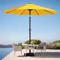 9 Ft. Market Solar LED Lighted Tilt Patio Umbrella Outdoor Steel Umbrella In Yellow 10 9 Ft. Market Solar LED Lighted Tilt Patio Umbrella Outdoor Steel Umbrella In Yellow -More Furniture Store jearey market umbrellas dzzzs 9 ye 40 1000