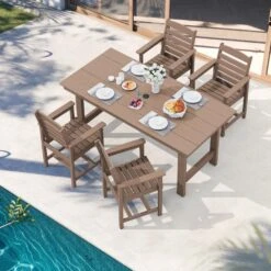 Charlottetown Brown 7-Piece Wicker Outdoor Dining Set With Brown Cushion