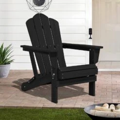Black Folding HDPE Outdoor Patio Plastic Adirondack Chair With Ergonomic Design (1-Pack)